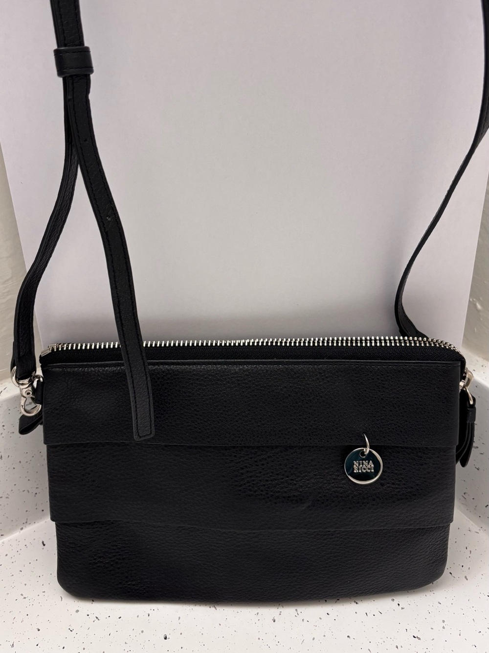 Nina Ricci Black Leather Crossbody Bag with Logo Charm